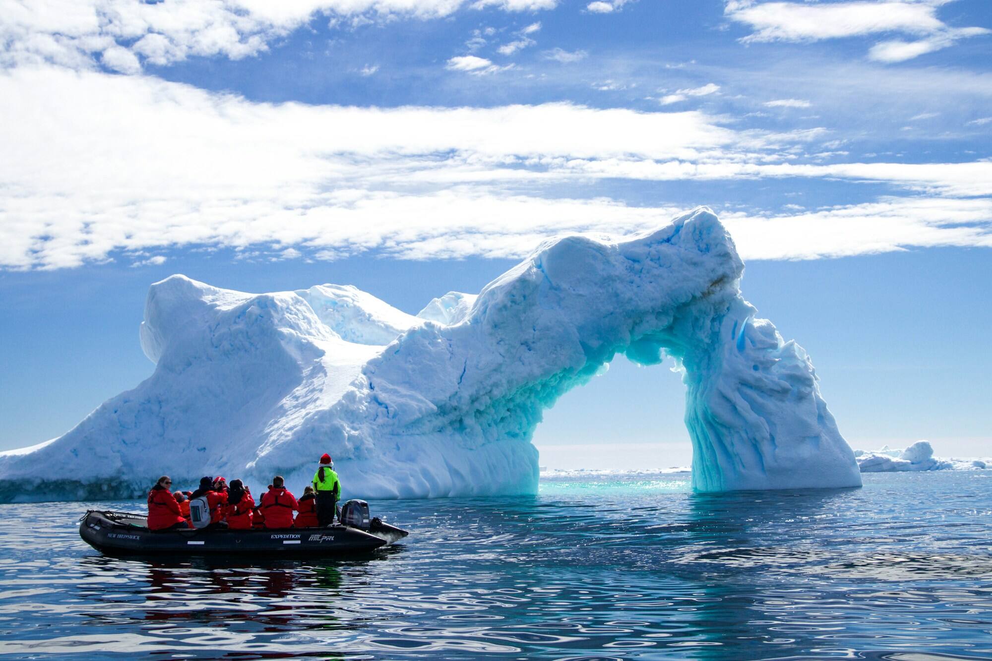 Zodiac cruising the iceberg graveyard